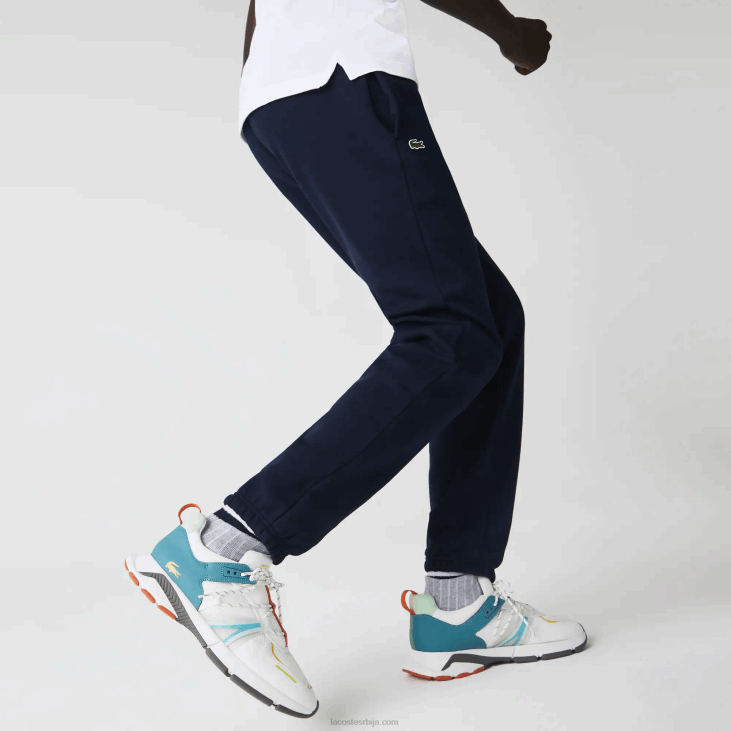 мушкарци спортске панталоне од флиса за тенис 86881151 тамноплава 166 Lacoste