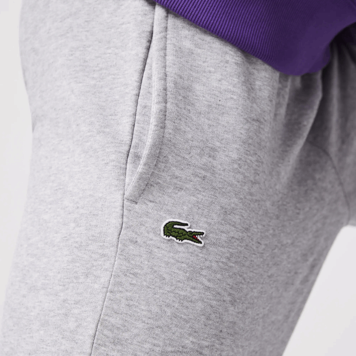 мушкарци спортске панталоне од флиса за тенис 86881152 сиви кине цца Lacoste