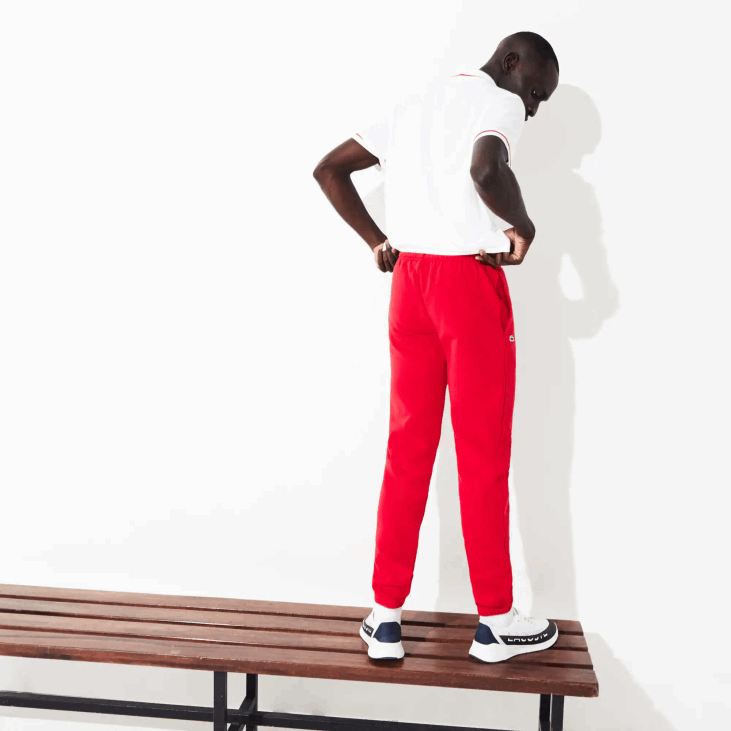 мушкарци спортске панталоне од флиса за тенис 86881153 црвена 240 Lacoste