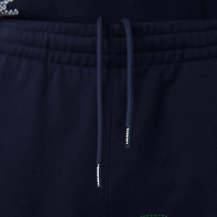 мушкарци памучне памучне панталоне за трчање са деструктурираним брендирањем наслеђа 86881206 тамноплава 166 Lacoste