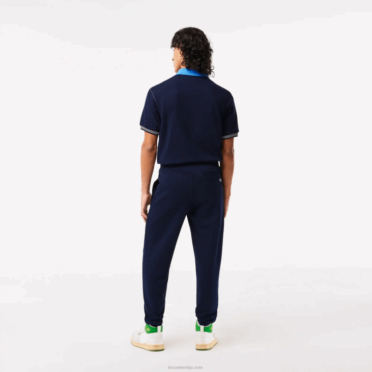 мушкарци панталоне од небрушеног флиса 8688309 тамноплава 166 Lacoste