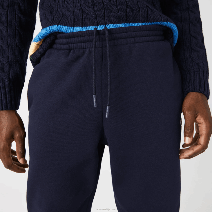 мушкарци панталоне од флиса суженог кроја 8688348 тамноплава 166 Lacoste