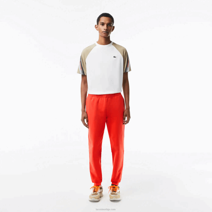 мушкарци панталоне од флиса суженог кроја 8688374 наранџаста 02к Lacoste