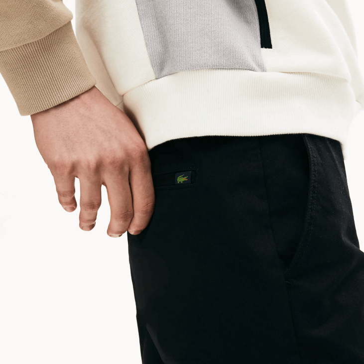 мушкарци слим фит растезљиве панталоне од габардина 8688548 црна 031 Lacoste