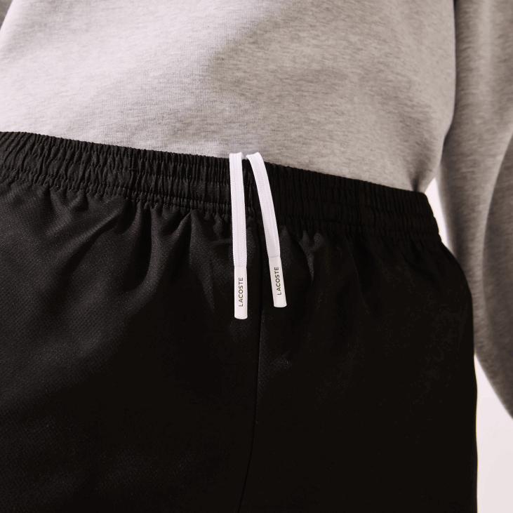 мушкарци спортске тренерке од лагане тканине 8688550 црна 031 Lacoste