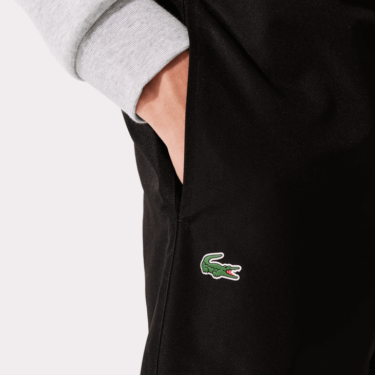 мушкарци спортске тренерке од лагане тканине 8688550 црна 031 Lacoste