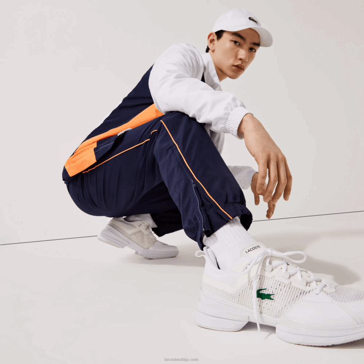 мушкарци спортска брендирана цолорблоцк тренерка 86881156 бела наранџаста тамноплава 8ти Lacoste